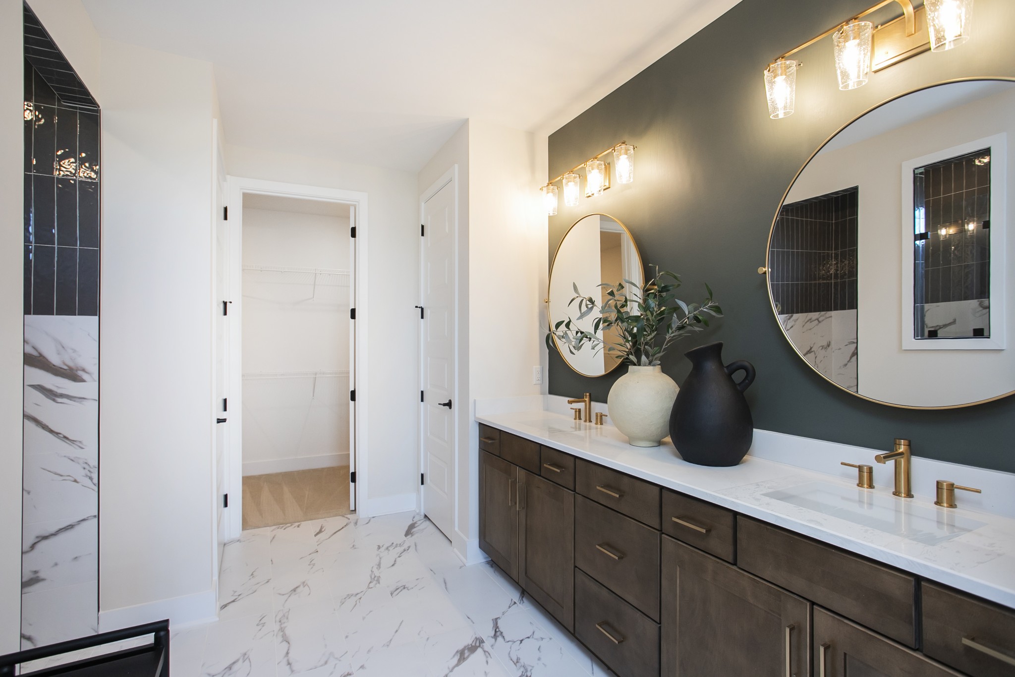 19 Pinnacles Lane Lebanon, TN 37090 - Photo 28 of 50 a bathroom with a double vanity sink and a mirror