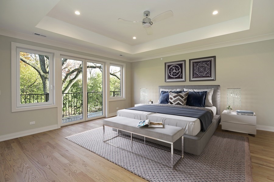 4032 Picardy Drive Northbrook, IL 60062 - Photo 16 of 38 a spacious bedroom with a bed and a large window