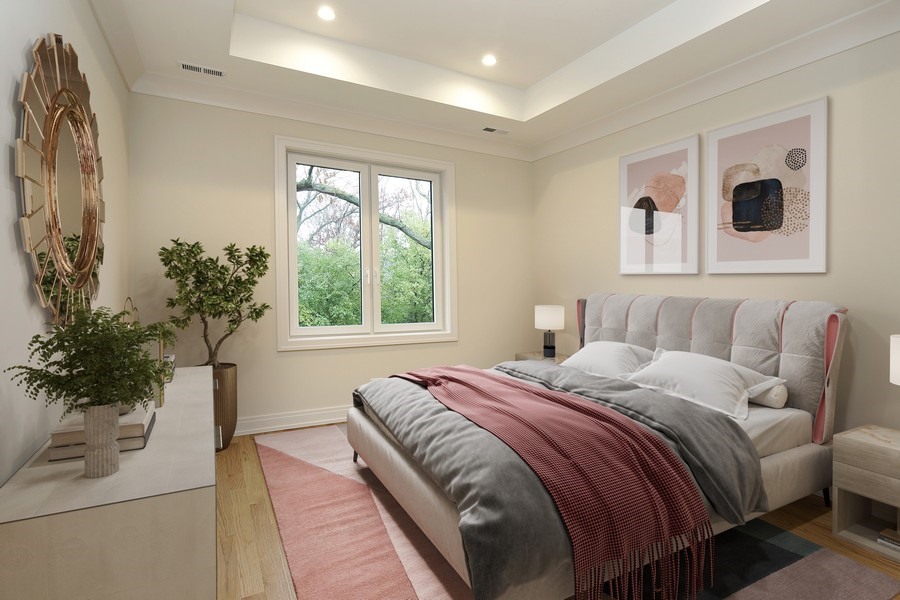 4032 Picardy Drive Northbrook, IL 60062 - Photo 22 of 38 a bedroom with bed and a potted plant