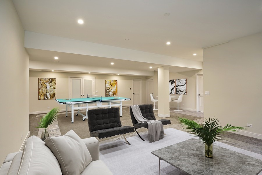 4032 Picardy Drive Northbrook, IL 60062 - Photo 26 of 38 a living room with furniture a potted plant and kitchen view