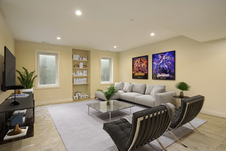 4032 Picardy Drive Northbrook, IL 60062 - Photo 27 of 38 a living room with furniture and a flat screen tv