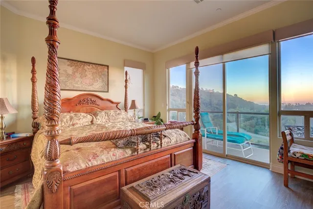 a bathroom with a granite countertop shower a toilet and a sink