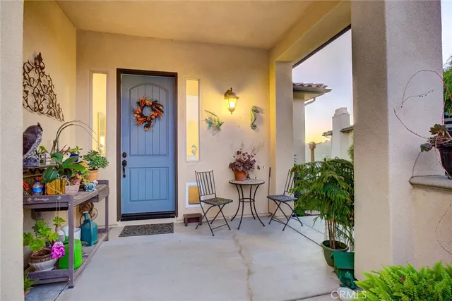 a view of a hallway with paintings on the wall