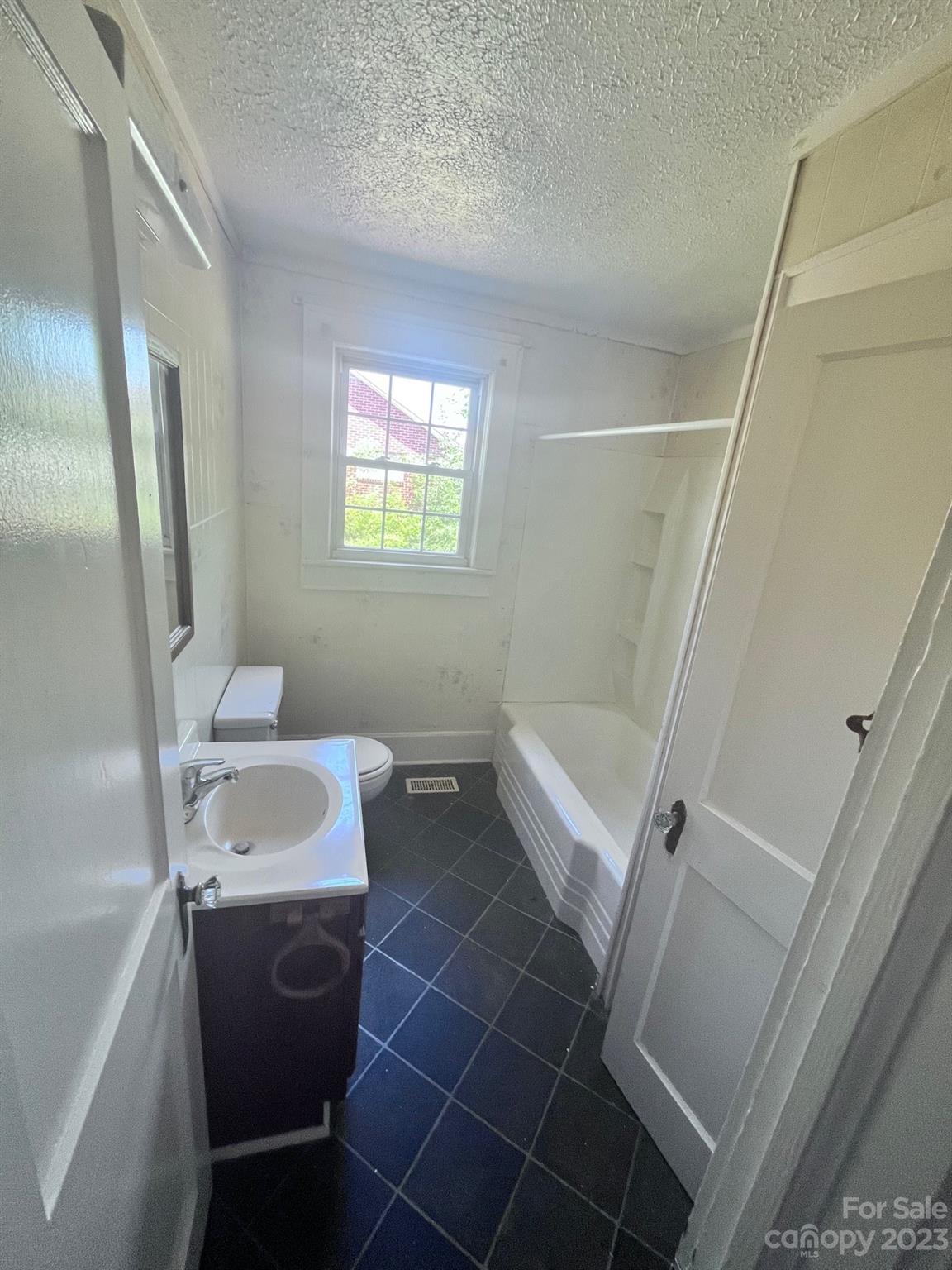 110 Webb Road Shelby, NC 28152 - Photo 13 of 19 a bathroom with a sink toilet and tub