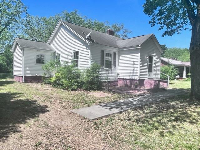 110 Webb Road Shelby, NC 28152 - Photo 2 of 19 a view of a house with a yard and large tree