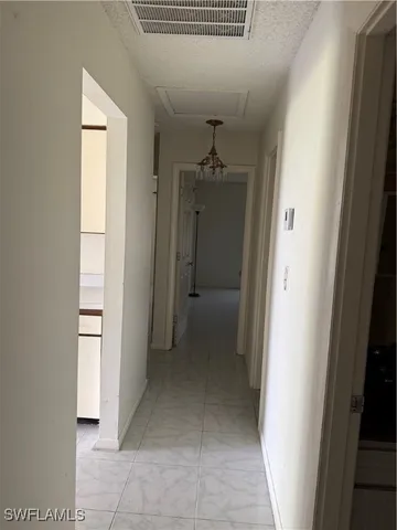 a bathroom with a granite countertop sink toilet and a shower
