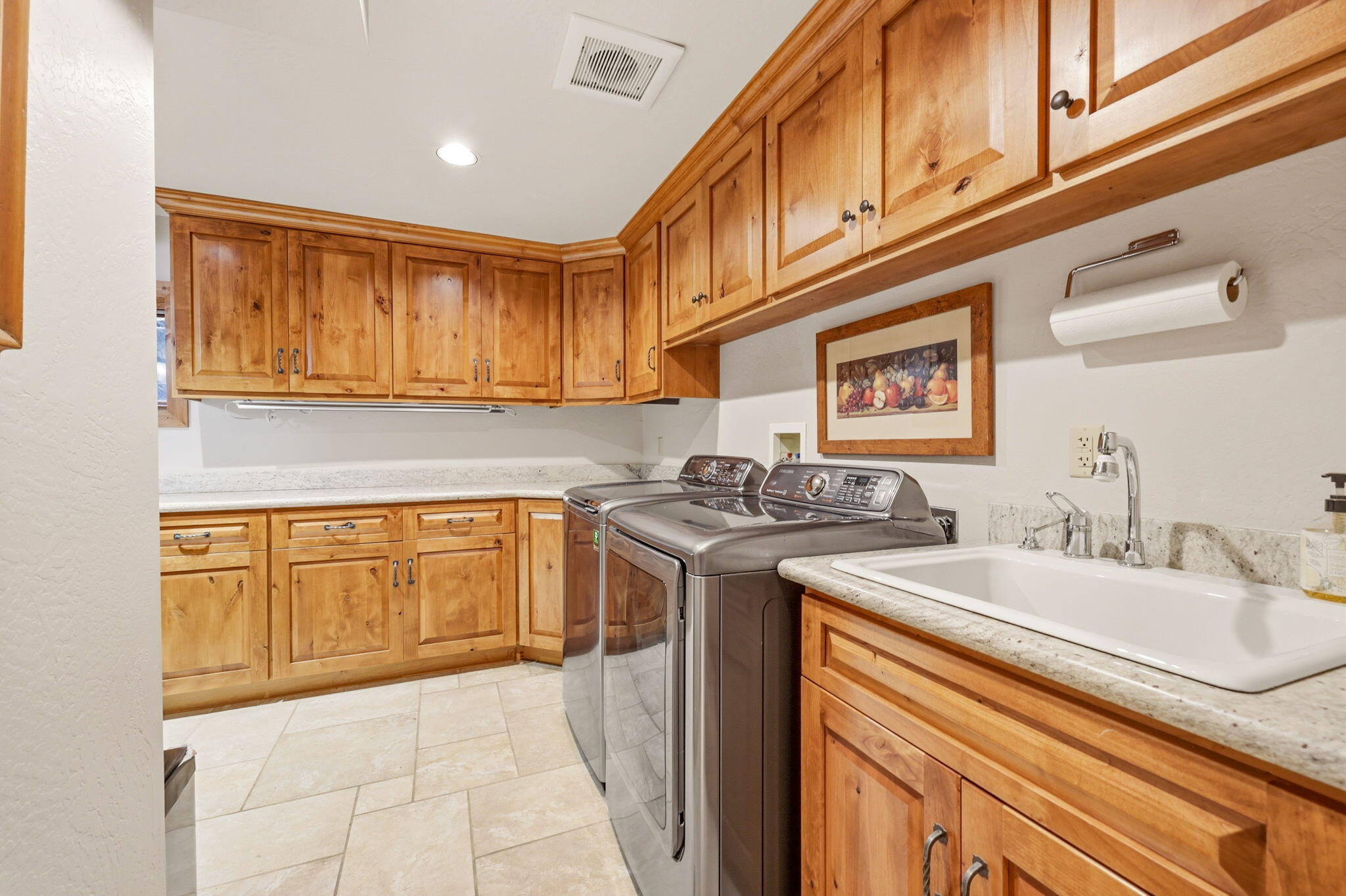 985 Elliott Creek Road Wilderville, OR 97543 - Photo 46 of 98 a kitchen with stainless steel appliances granite countertop a sink and cabinets