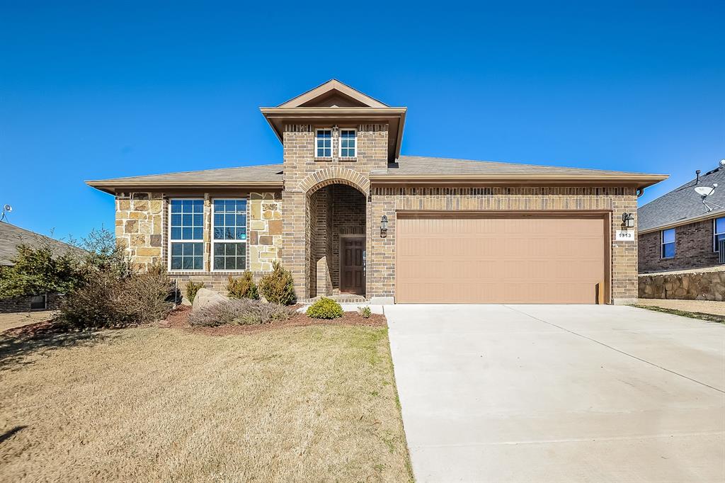1313 Meadowlakes Drive Azle, TX 76020 - Photo 1 of 1 a front view of a house with a yard