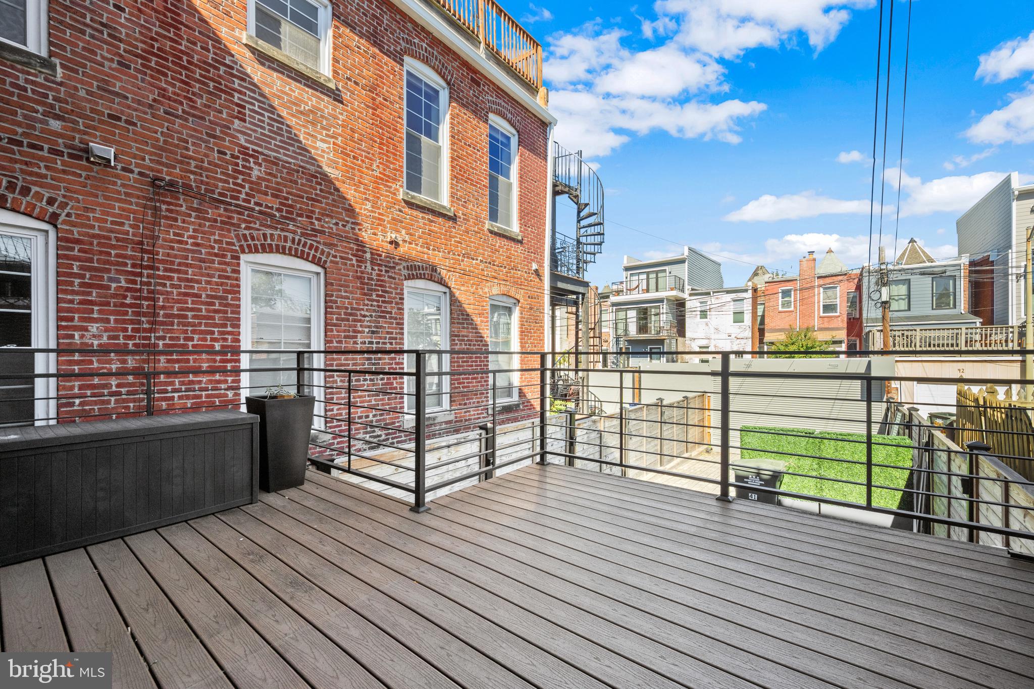 41 R Street Northwest Washington, DC 20001 - Photo 17 of 43 a view of a balcony with wooden floor