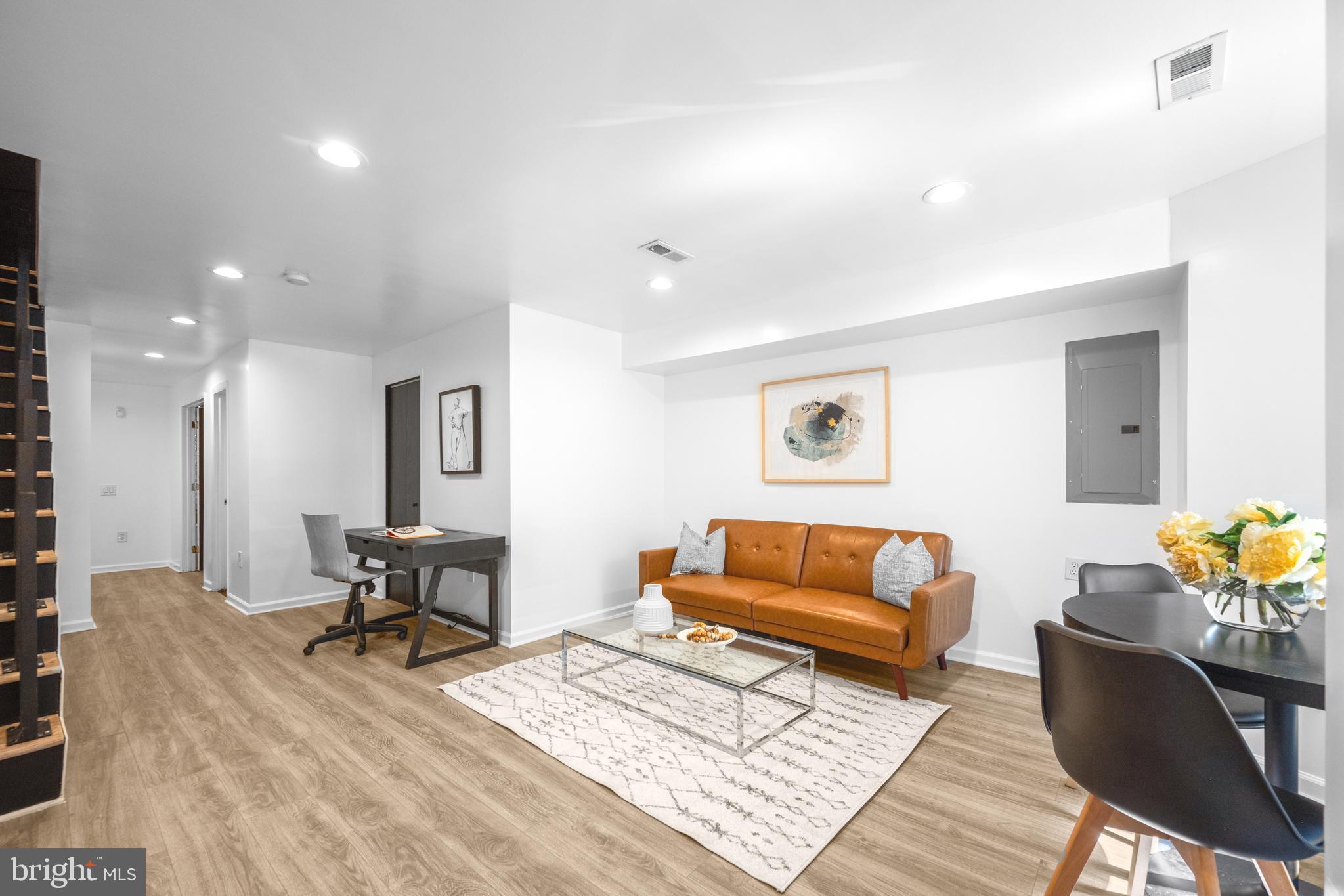 41 R Street Northwest Washington, DC 20001 - Photo 28 of 43 a living room with furniture and a rug