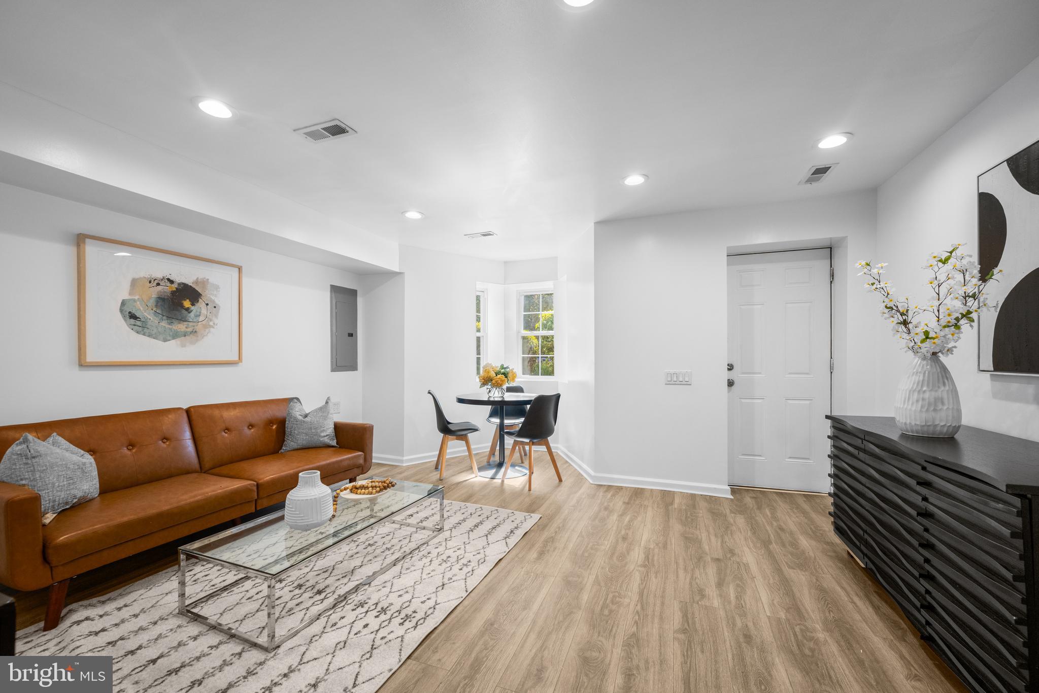 41 R Street Northwest Washington, DC 20001 - Photo 31 of 43 a living room with furniture and a wooden floor