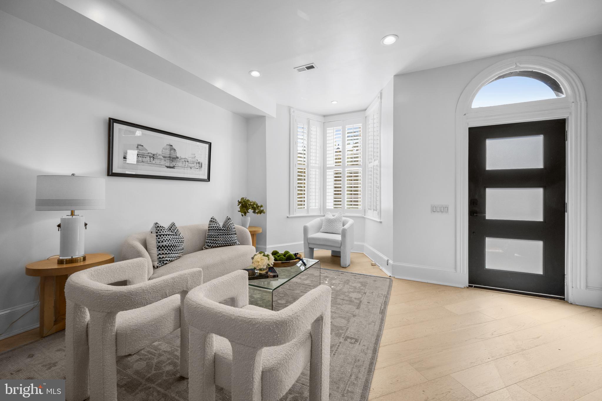 41 R Street Northwest Washington, DC 20001 - Photo 6 of 43 a living room with furniture a window and wooden floor