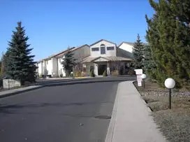 787 Northwest Canal Boulevard Redmond, OR 97756 - Photo 3 of 10 a front view of a house with a yard