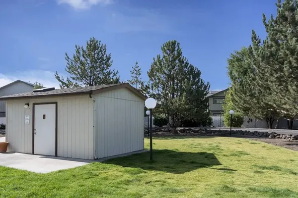 a backyard of a house with lots of green space