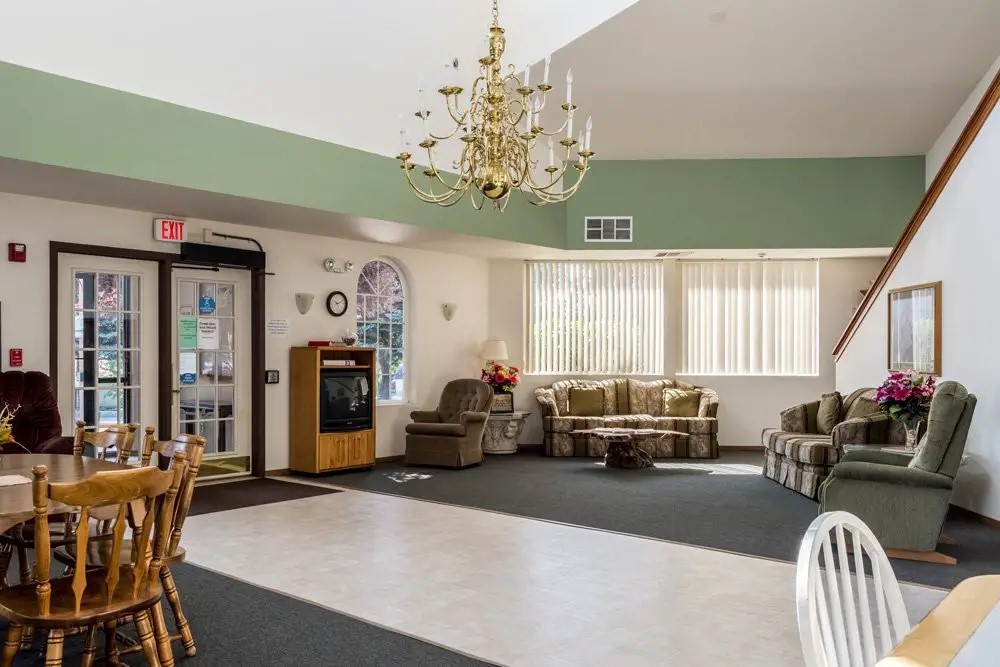 787 Northwest Canal Boulevard Redmond, OR 97756 - Photo 8 of 10 a living room with furniture chandelier and a window