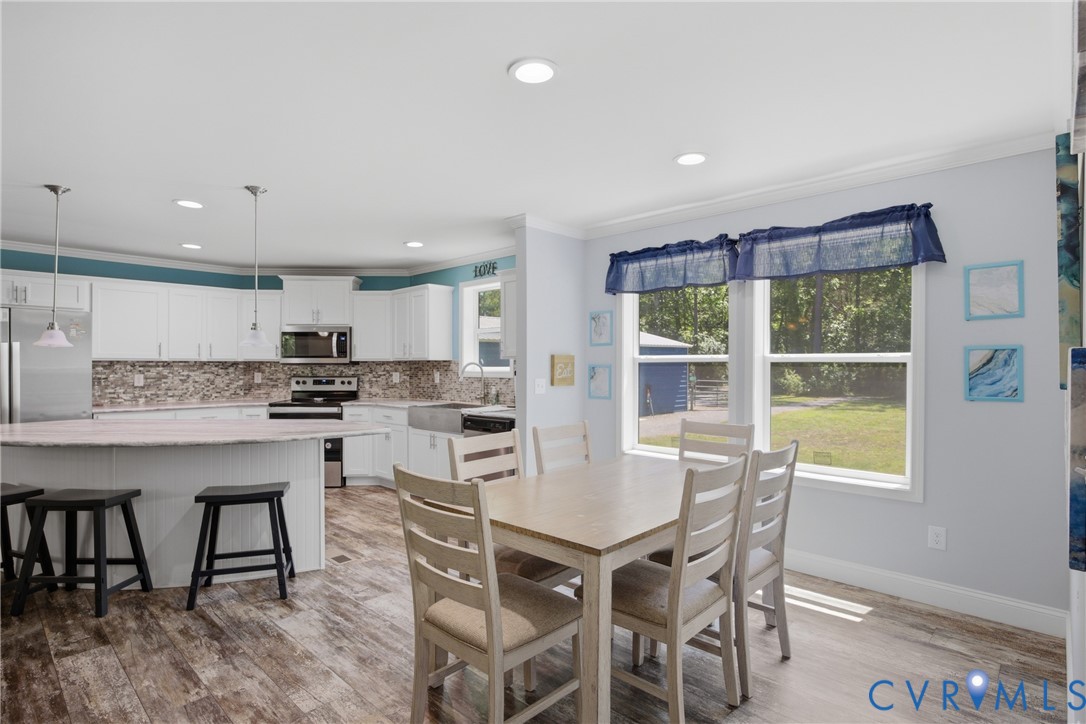 93 Faraway Road Saluda, VA 23149 - Photo 9 of 58 a kitchen with a table and chairs in it