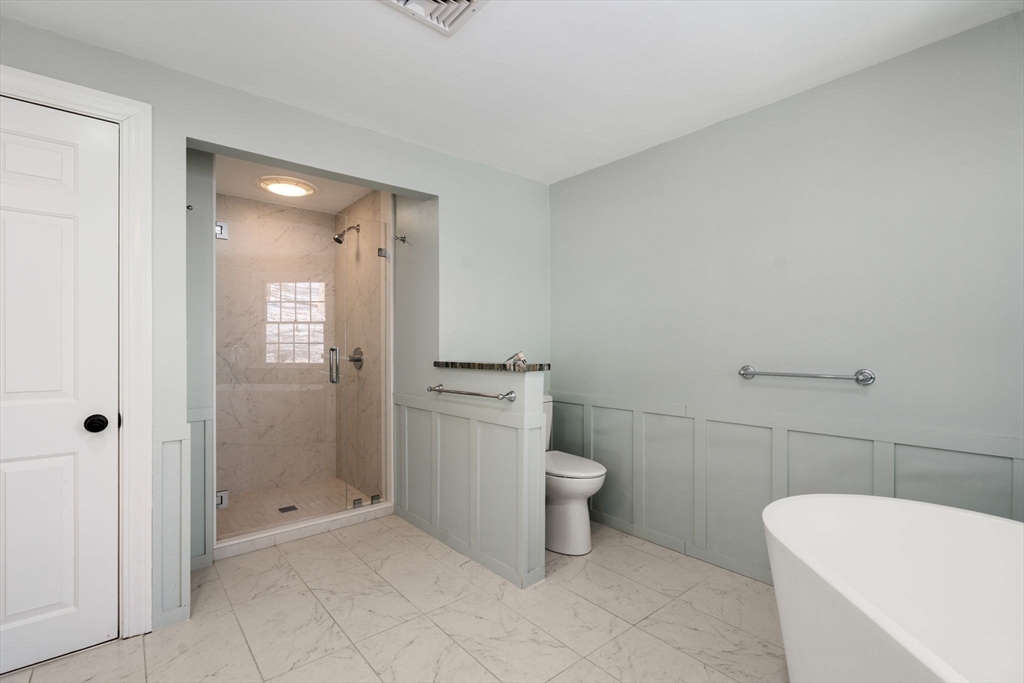 141 Hampshire Road Wellesley, MA 02481 - Photo 20 of 33 a bathroom with a toilet and a shower