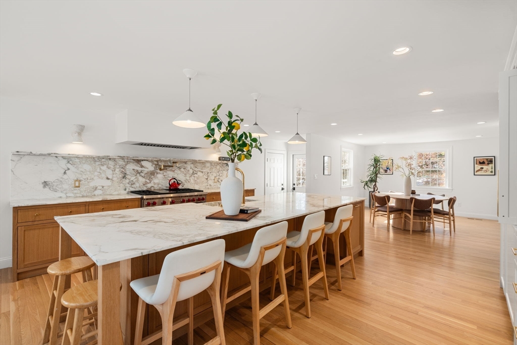 141 Hampshire Road Wellesley, MA 02481 - Photo 5 of 33 a view of a dining room with furniture and wooden floor