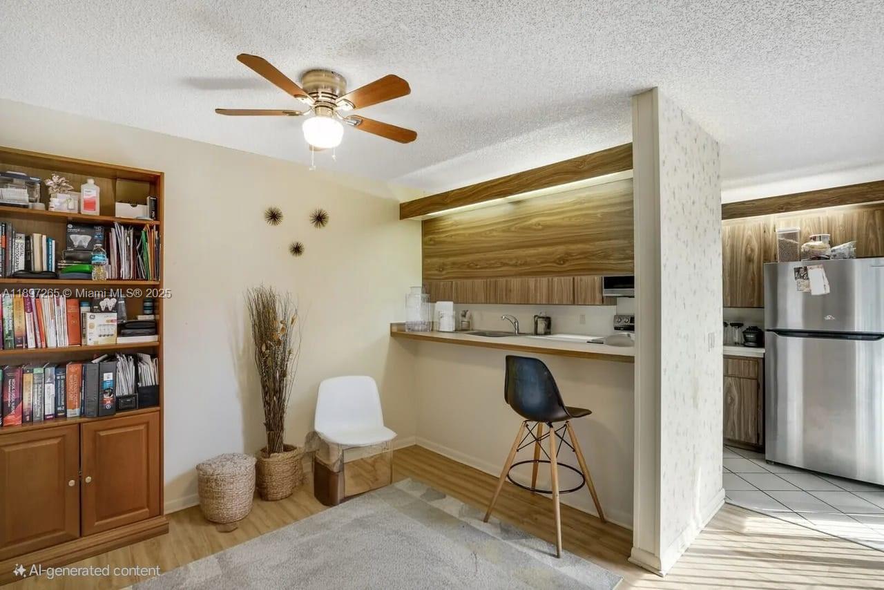 629 6th Way West Palm Beach, FL 33407 - Photo 5 of 10 a workspace with furniture and window