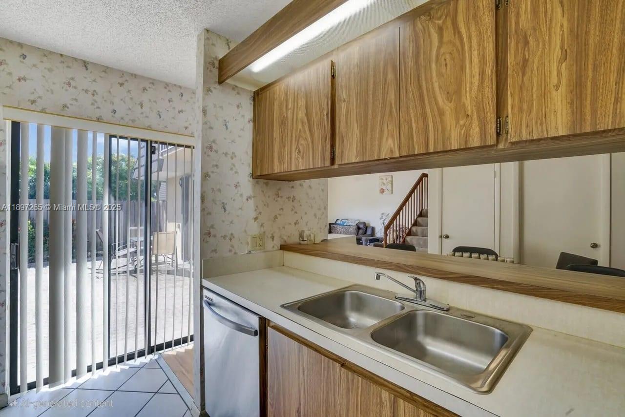 629 6th Way West Palm Beach, FL 33407 - Photo 6 of 10 a kitchen with a sink and cabinets