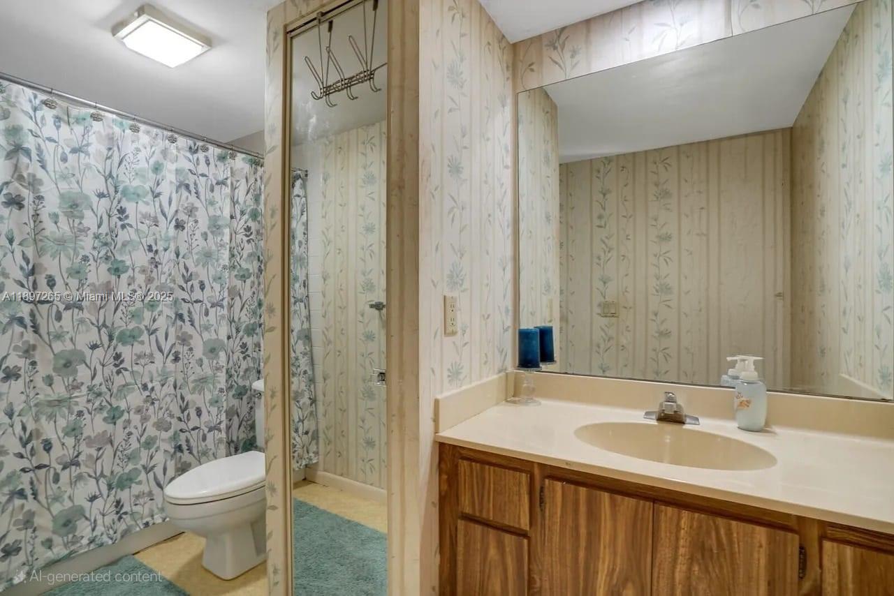 629 6th Way West Palm Beach, FL 33407 - Photo 9 of 10 a bathroom with a sink toilet and shower