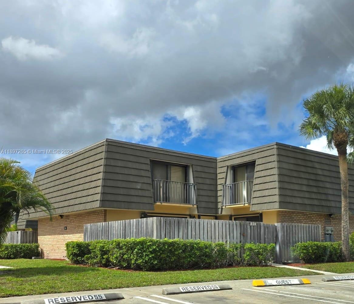 629 6th Way West Palm Beach, FL 33407 - Photo 10 of 10 a front view of a house with a yard