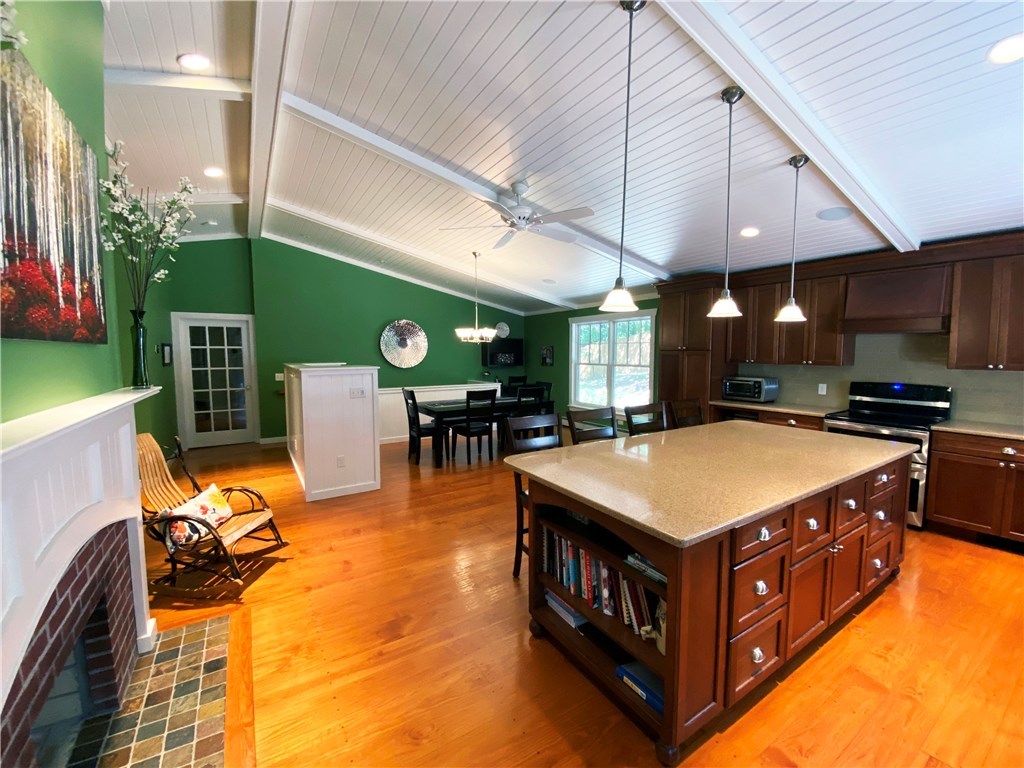 220 Old County Road Smithfield, RI 02917 - Photo 7 of 32 Open Kitchen and dining room with fireplace
