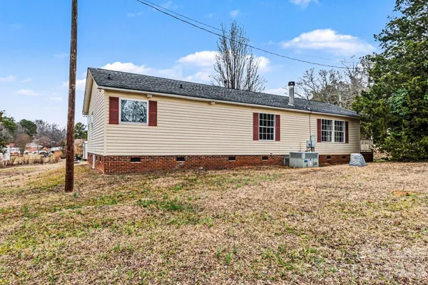 a house view with a backyard space