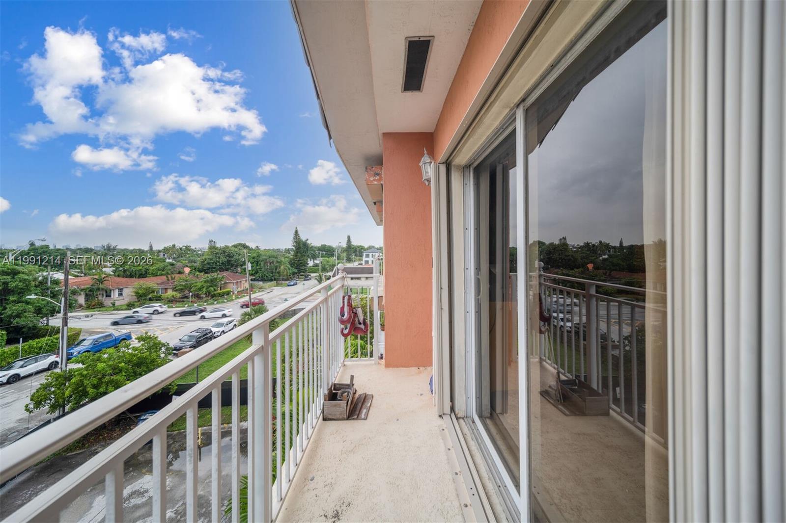 9008 Collins Avenue, Unit 402 Surfside, FL 33154 - Photo 16 of 62 a view of a balcony with a yard