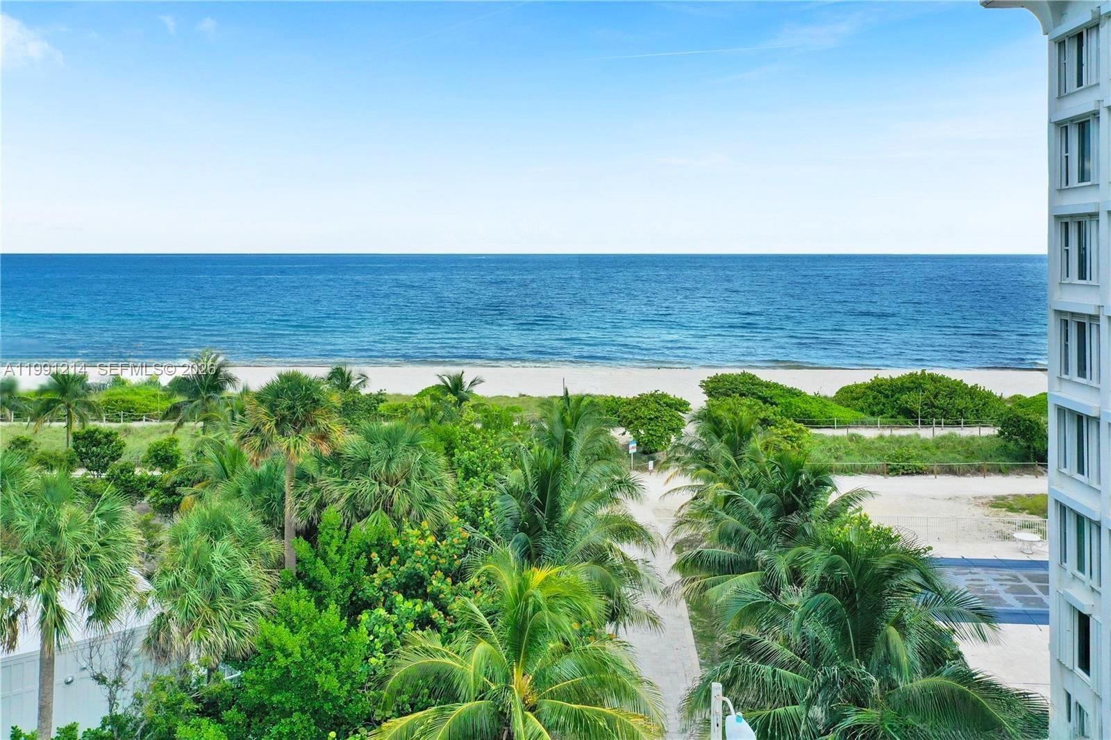 9008 Collins Avenue, Unit 402 Surfside, FL 33154 - Photo 46 of 62 a view of an ocean beach