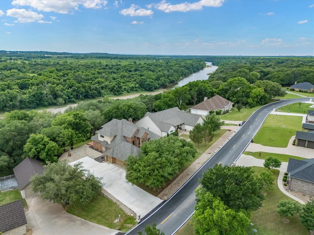 10106 Ravenswood Road Granbury, TX 76049 - Photo 38 of 39 an aerial view of a house