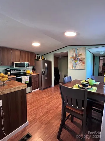 a view of a dining room with furniture