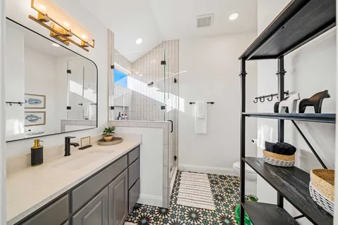 a kitchen with sink cabinets and stove