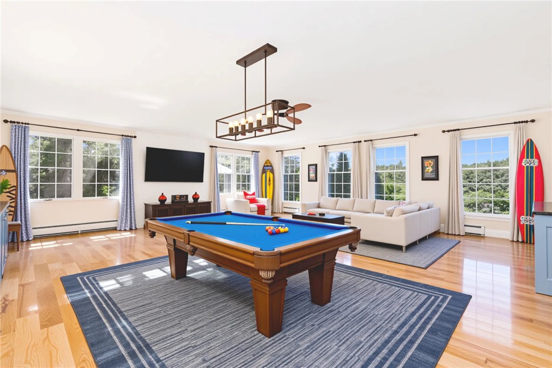 18 J H Dwyer Drive Middletown, RI 02842 - Photo 14 of 42 Virtually staged expansive den / family room which is 24'11" x 23'