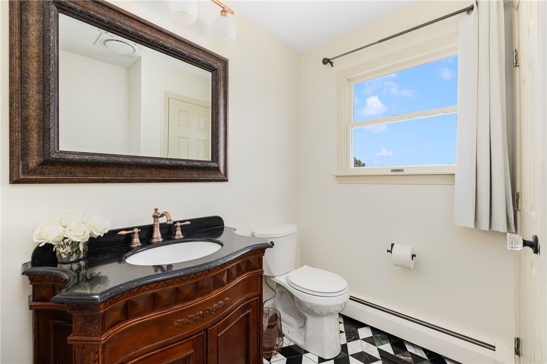18 J H Dwyer Drive Middletown, RI 02842 - Photo 37 of 42 Newly renovated bathroom with marble tile
