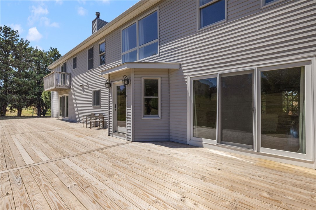 18 J H Dwyer Drive Middletown, RI 02842 - Photo 41 of 42 Newer deck runs length of house measuring 63"7" x 14"9" perfect for enjoying the outdoors and the expansive backyard