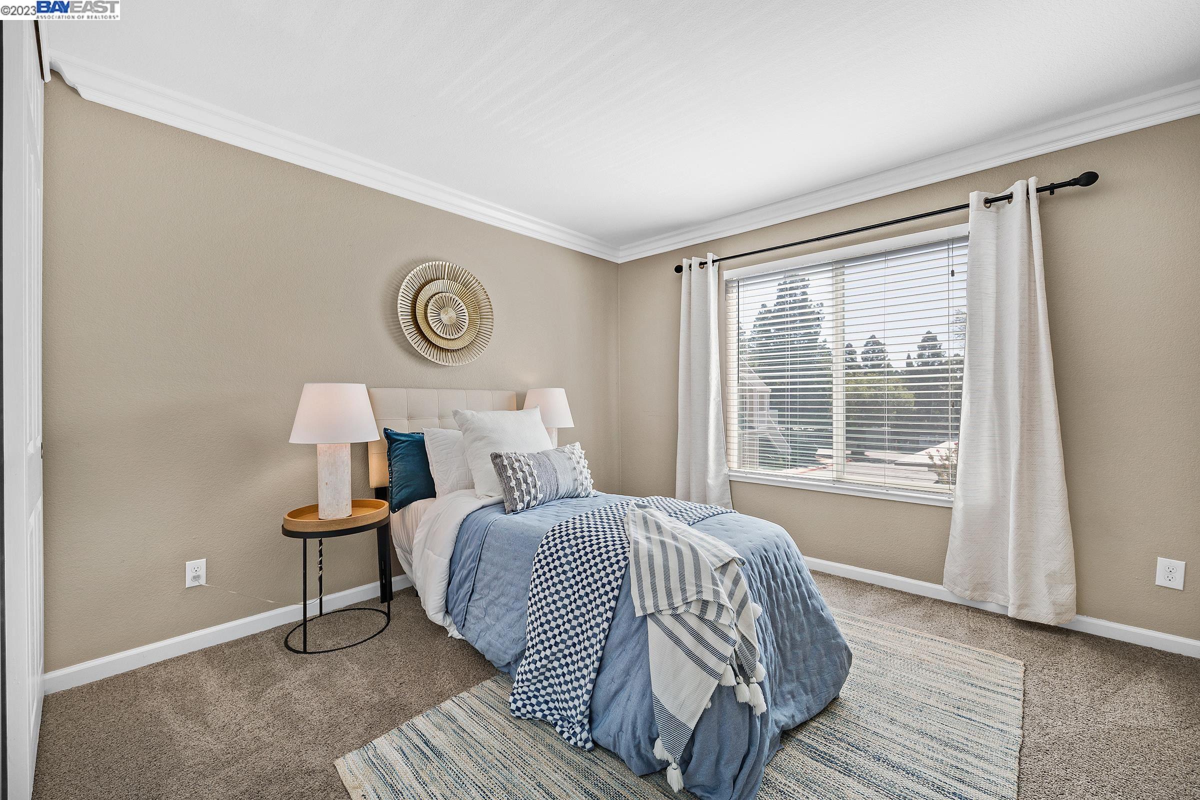 245 Reflections Drive San Ramon, CA 94583 - Photo 20 of 42 a bedroom with a bed and a window