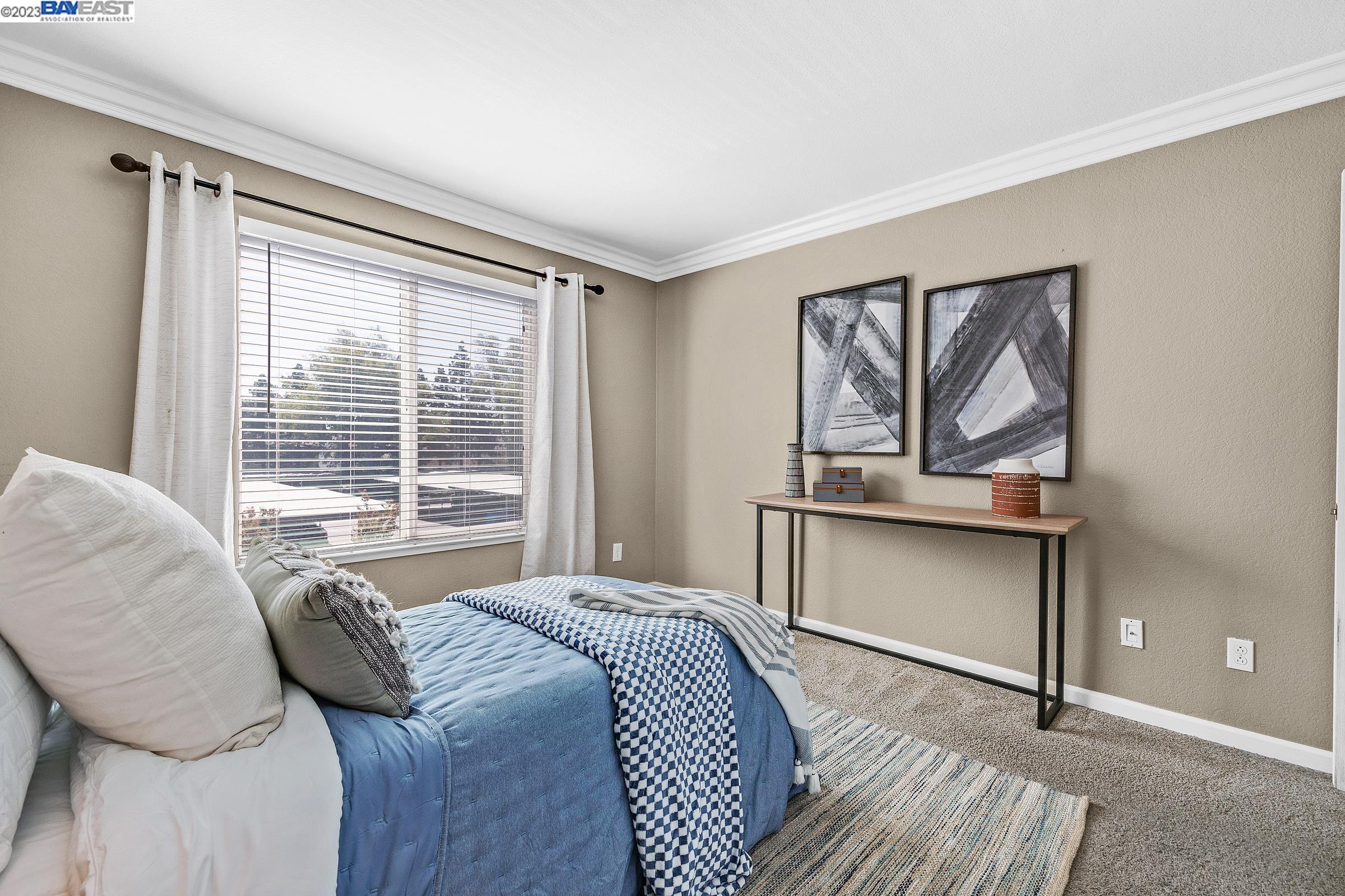 245 Reflections Drive San Ramon, CA 94583 - Photo 22 of 42 a bedroom with a bed and window