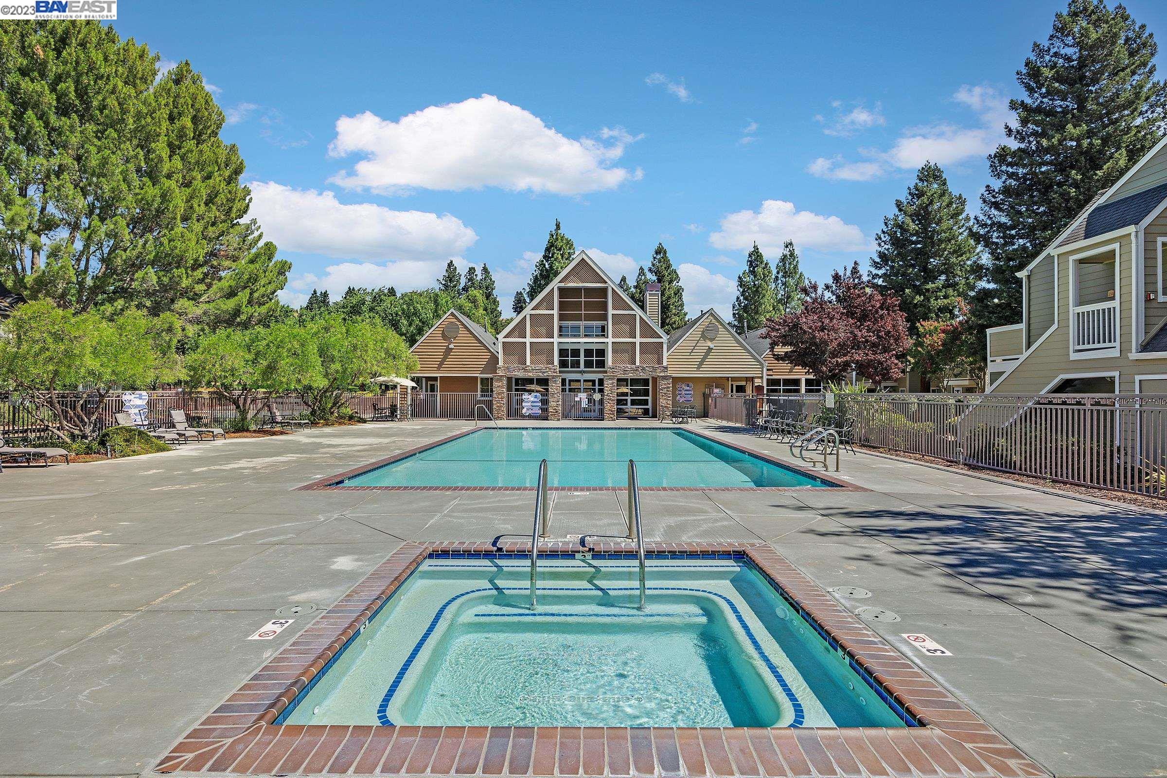 245 Reflections Drive San Ramon, CA 94583 - Photo 26 of 42 a view of a tennis ground with large trees