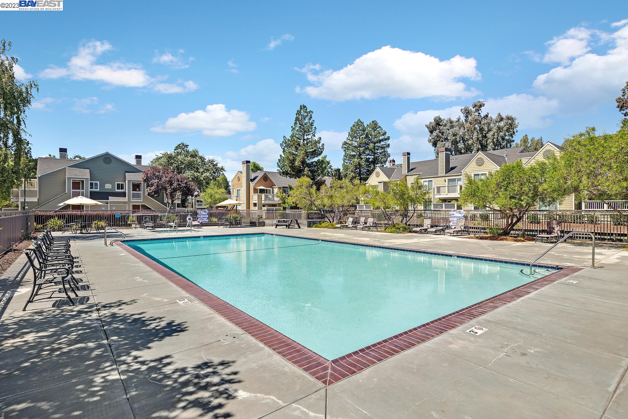 245 Reflections Drive San Ramon, CA 94583 - Photo 27 of 42 a view of swimming pool with outdoor seating and city view