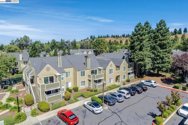 an aerial view of a house with a garden
