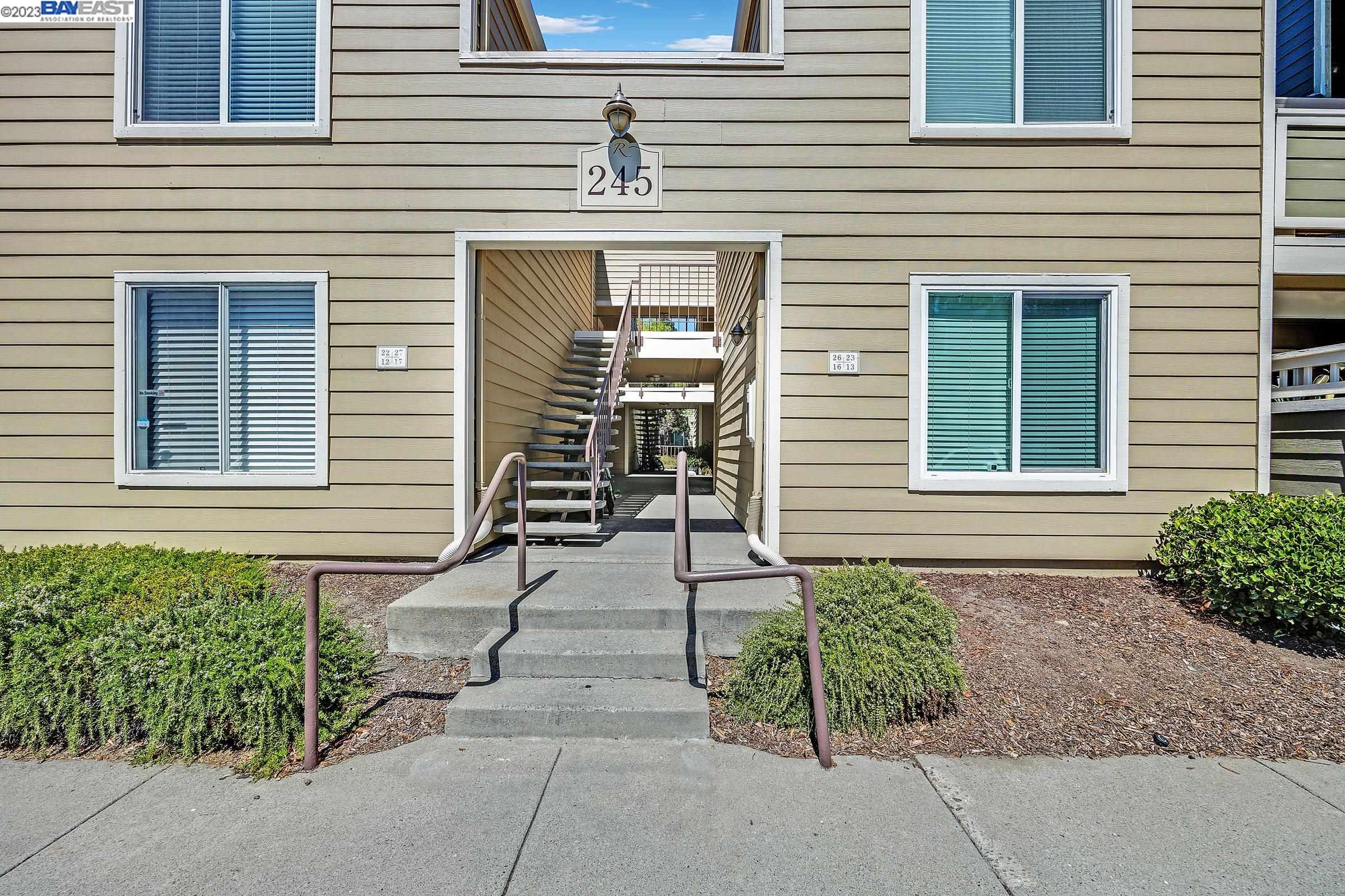 245 Reflections Drive San Ramon, CA 94583 - Photo 6 of 42 a front view of a house with a garden