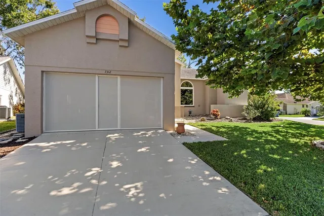 $405,900 | 7312 Bottle Brush Drive, Spring Hill, FL 34606