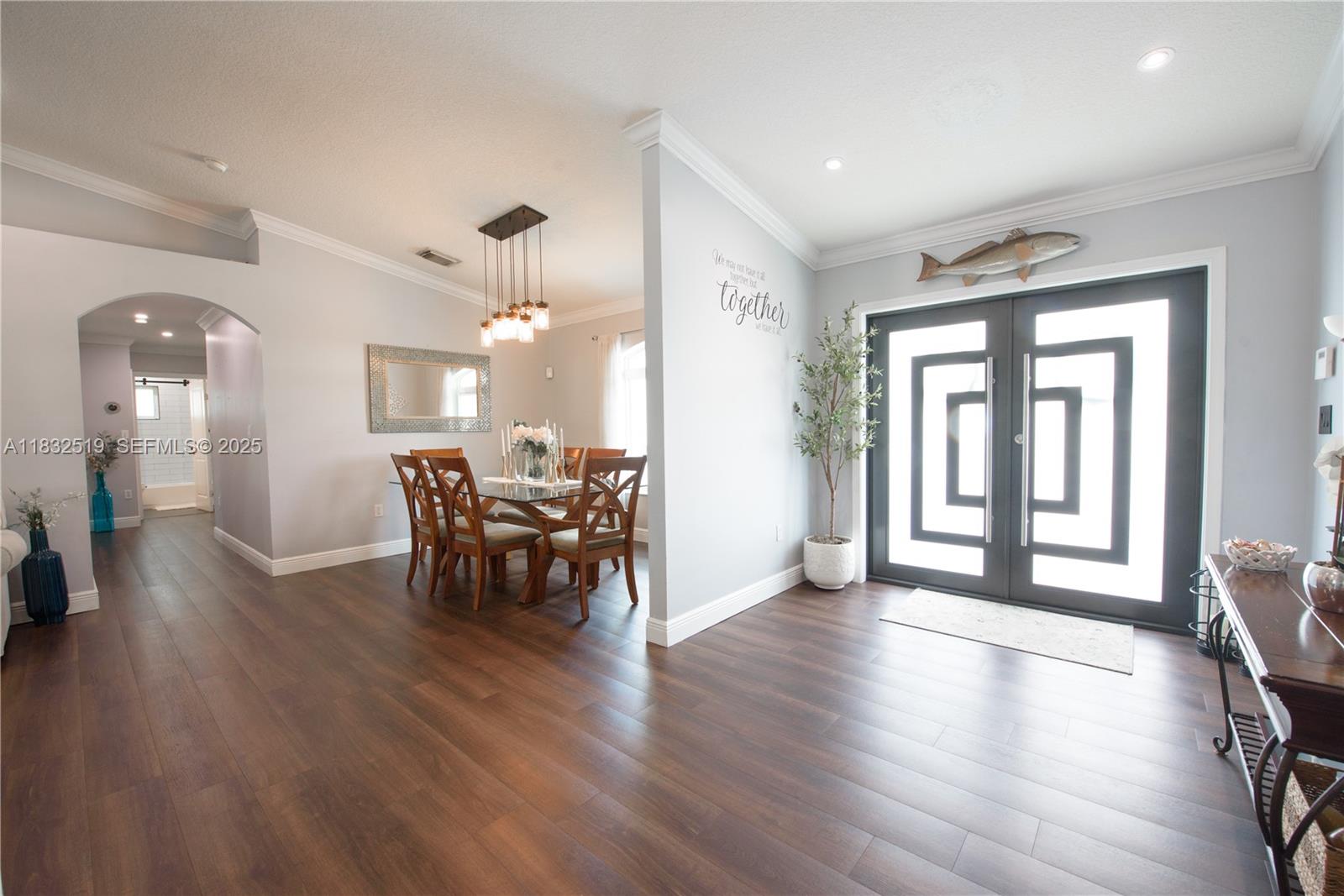 18740 Southwest 297th Street Homestead, FL 33030 - Photo 13 of 46 a view of a livingroom with furniture and a large window