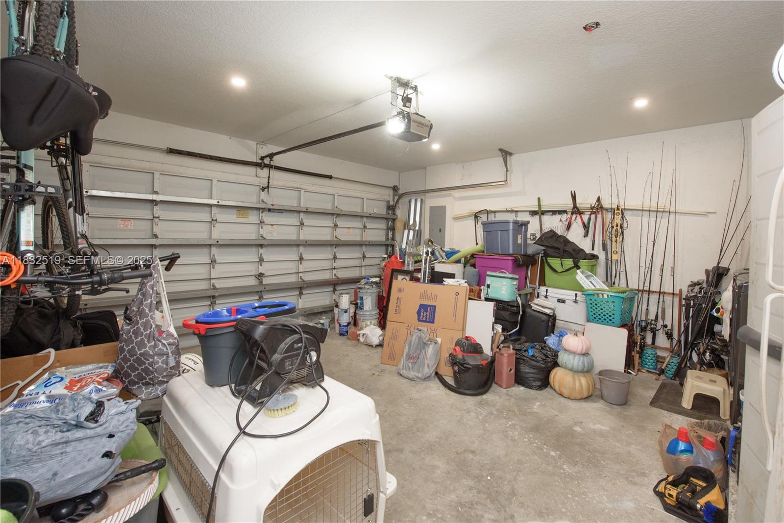 18740 Southwest 297th Street Homestead, FL 33030 - Photo 20 of 46 a storage room with lots of storage