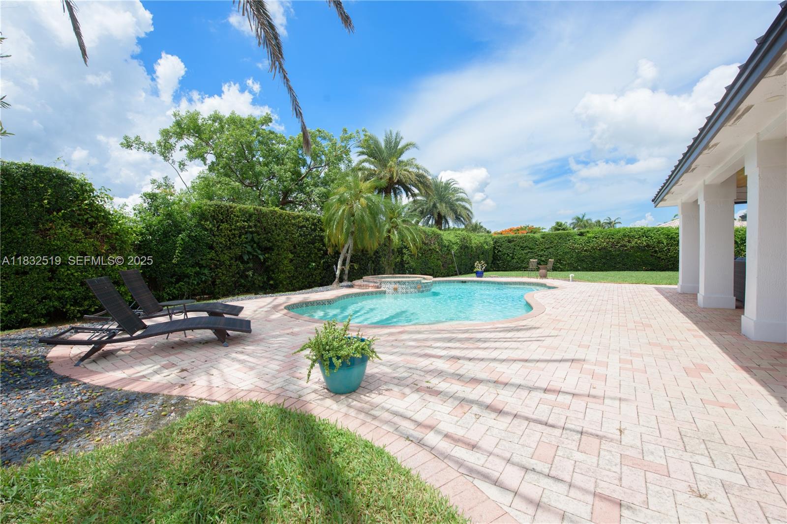 18740 Southwest 297th Street Homestead, FL 33030 - Photo 22 of 46 a view of a garden with a patio