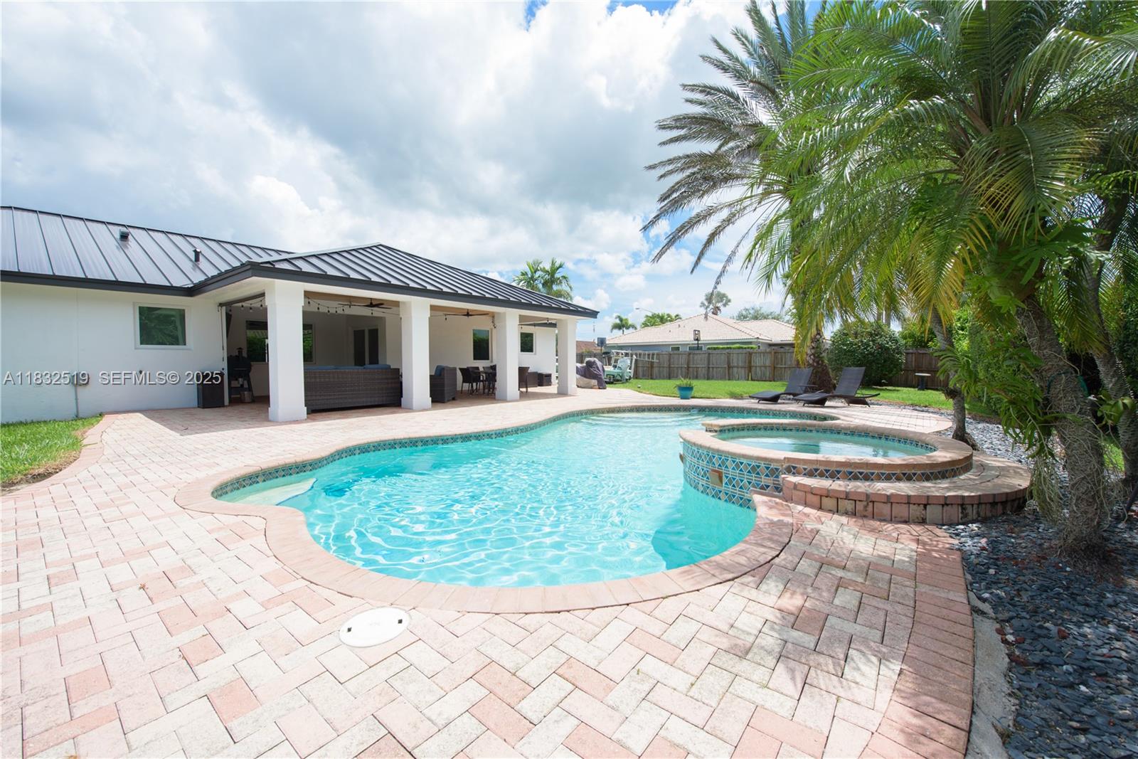 18740 Southwest 297th Street Homestead, FL 33030 - Photo 24 of 46 a view of outdoor space yard swimming pool and porch