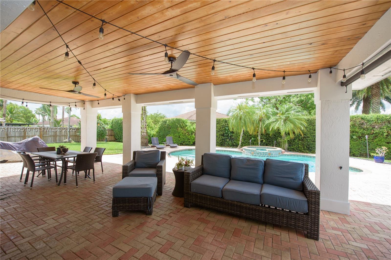 18740 Southwest 297th Street Homestead, FL 33030 - Photo 28 of 46 a living room with furniture and a large window