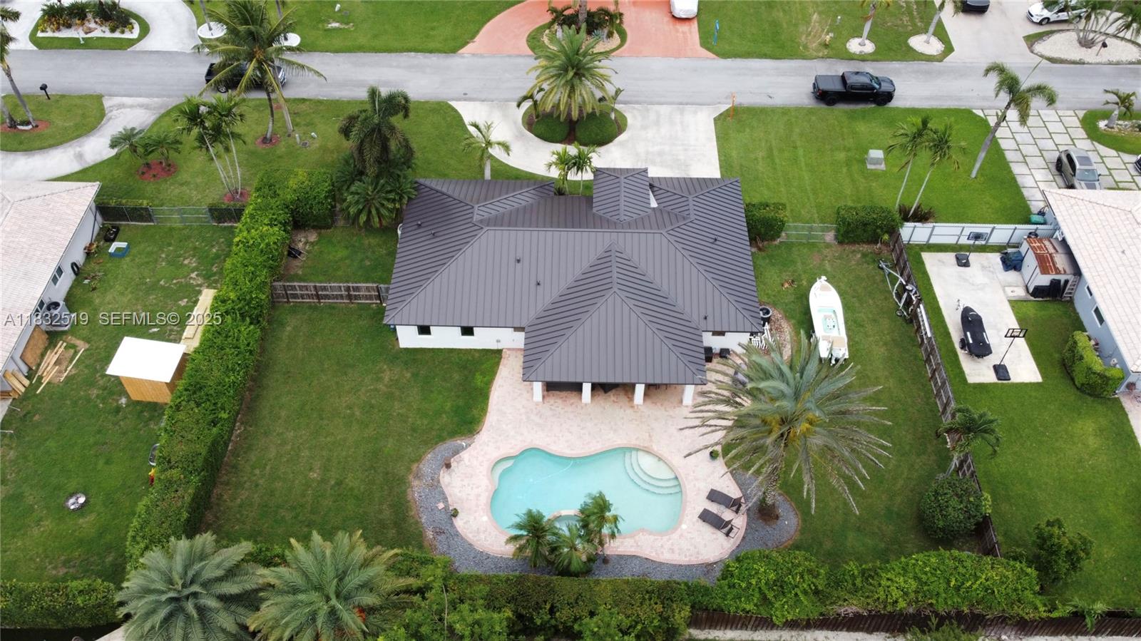 18740 Southwest 297th Street Homestead, FL 33030 - Photo 33 of 46 an aerial view of a house with a garden