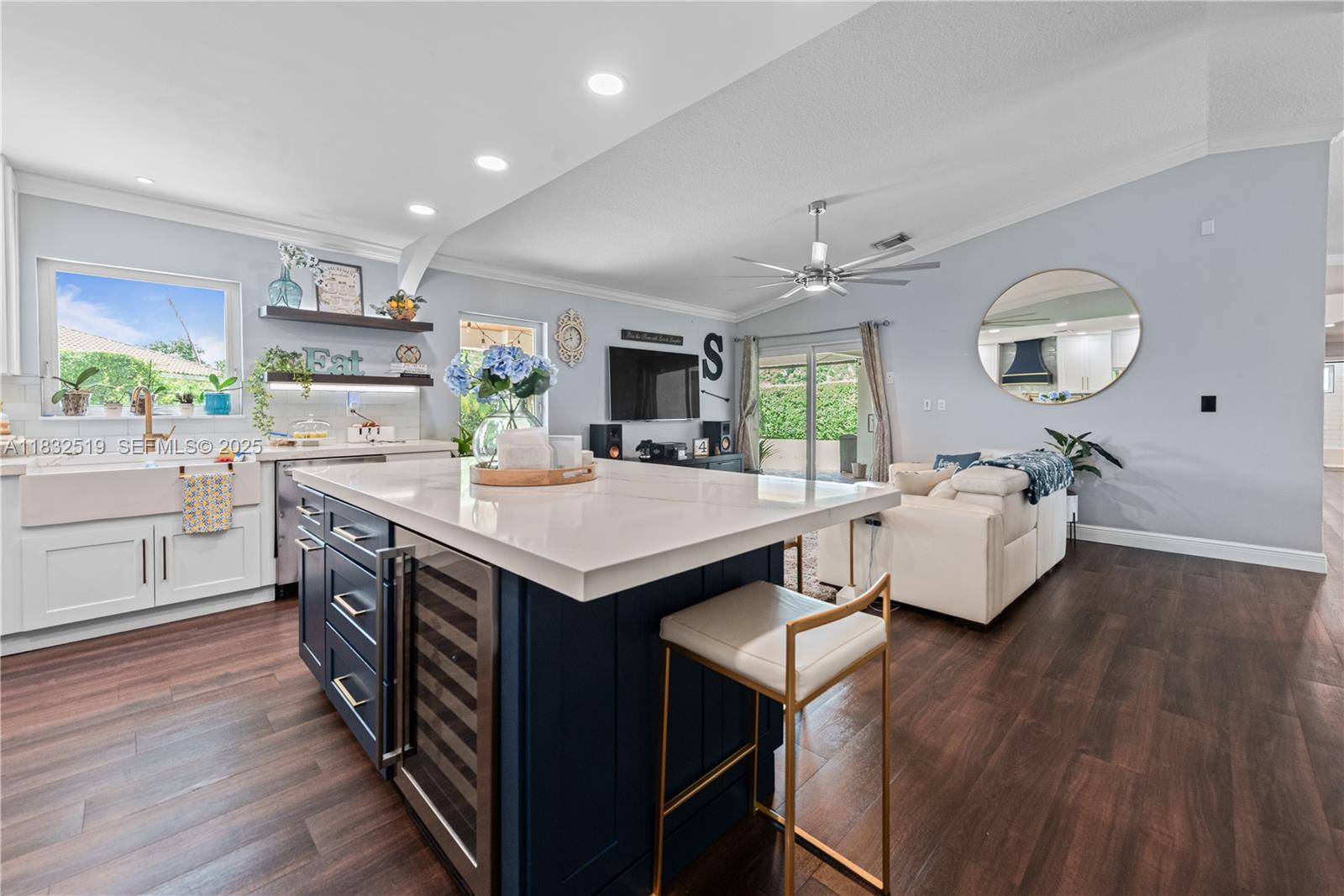 18740 Southwest 297th Street Homestead, FL 33030 - Photo 4 of 46 a kitchen with a sink a counter top space stainless steel appliances and a window
